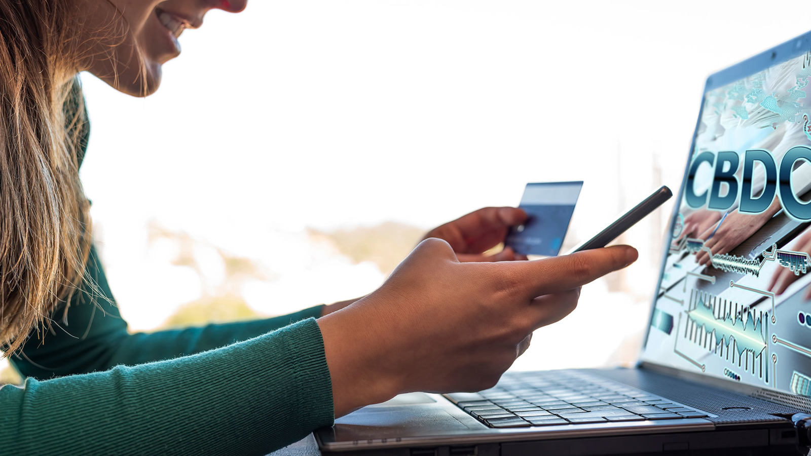 Bankieren met telefoon en laptop