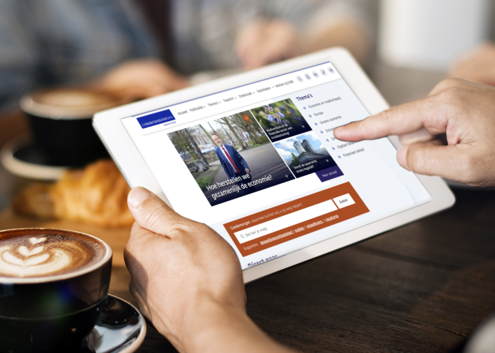 iPad die de site van DNB laat zien